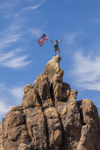 Photo: Waving a flag on the summit. Waving a flag on the summit.