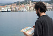Artist painting a picture, outdoors Artist painting a picture, outdoors