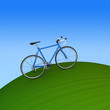 自転車と緑の丘