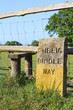 Engraved weathered stone sign for a public bridle way