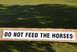 Do not feed the horses sign