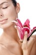 Closeup portrait of woman with lily