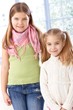 Portrait of little sisters smiling