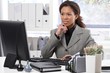 Attractive businesswoman working in office