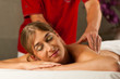 Woman enjoying wellness back massage