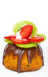 fruit cake with strawberries and kiwi fruit isolated on white
