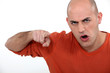 Angry man pointing his finger