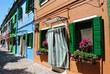 Colorful houses on the canals in Burano Island, Venice, Italy Colorful houses on the canals in Burano Island, Venice, Italy