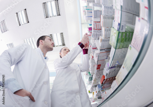 Photo: pharmacy drugstore people team pharmacy drugstore people team