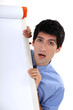 Man stood by flip-chart