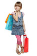 Full length of little girl with shopping bags over white