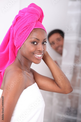 Photo: portrait of a young woman in bathroom portrait of a young woman in bathroom