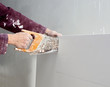 cutting plasterboard plaster hand dirty saw