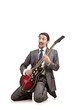 Young guitar player isolated on white Young guitar player isolated on white