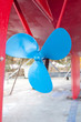 blue sailboat propeller in a red hull