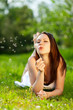 Young Female Wishing on a Dandelion Young Female Wishing on a Dandelion