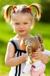 little girl with doll