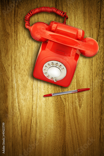 Photo: red phone red pen red phone red pen