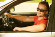 Photo: young man in car young man in car