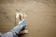 trowel with glove hand plastering cement mortar