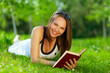 Beautiful Young woman reading a book in park Beautiful Young woman reading a book in park
