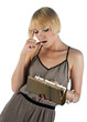 young woman looking in purse