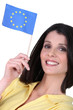 Woman holding a European Union flag