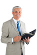 Mature Businessman with Open Binder Mature Businessman with Open Binder