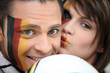 couple of German soccer supporters couple of German soccer supporters