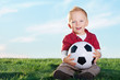 Cute Little Boy and his soccer ball Cute Little Boy and his soccer ball