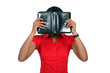 Woman hiding her face behind a leather-bound book