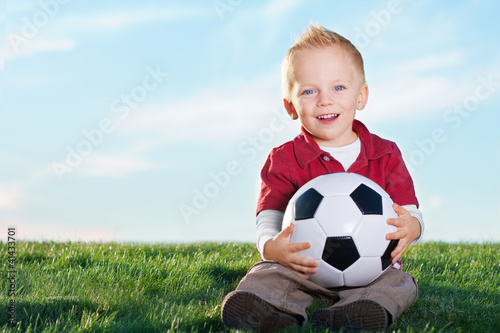 Photo: Cute Little Boy and his soccer ball Cute Little Boy and his soccer ball