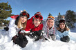 Four friends on skiing holiday