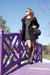 Beautiful young woman in spring garden