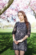 Beautiful young woman in spring garden