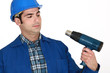 Man holding heater