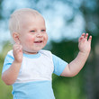 Happy little boy in the green park Happy little boy in the green park
