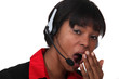 Woman with headset yawning