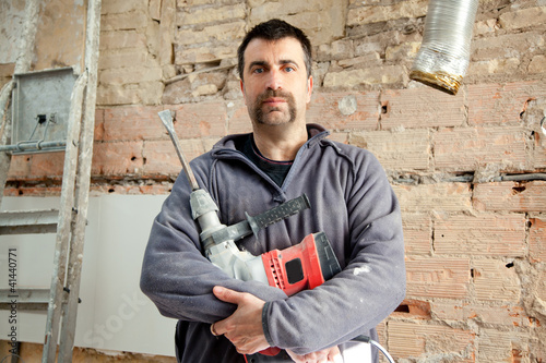 Foto: demolition hammer man mason manual worker demolition hammer man mason manual worker