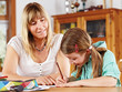 Photo: teenage girl and mother doing homework teenage girl and mother doing homework