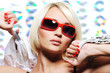 Beautiful glamour woman in red sunglasses