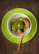 Juicy kiwi fruit in the white bowl,casual style