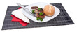 Burger on a plate isolated on white