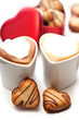 heart shaped cream cookies on red heart metal box and coffee heart shaped cream cookies on red heart metal box and coffee