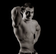 Bodybuilder showing his muscles Bodybuilder showing his muscles