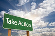 Photo: Take Action Green Road Sign and Clouds Take Action Green Road Sign and Clouds