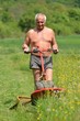 man with lawn mower man with lawn mower