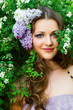 portrait of the young beautiful woman outdoors