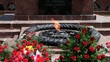 Flowers Lay Near Eternal Fire