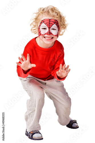 Foto: Kid with painted face. Kid with painted face.